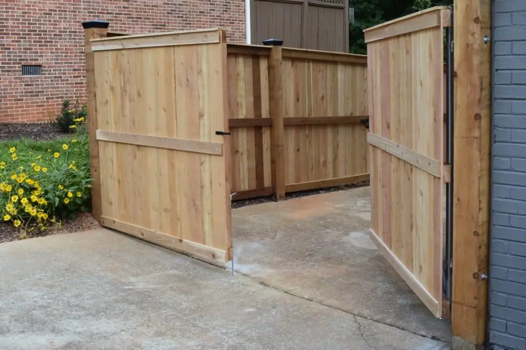 Wood fence with open gate